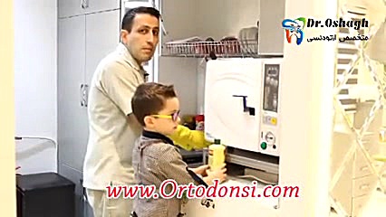 جرم گیری دندان دکتر مرتضی عشاق متخصص ارتودنسی