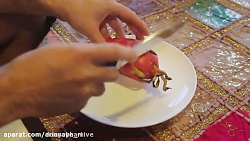 پوست کندن و خوردن میوه اژدها د...