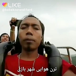 رفته شهر بازی سوار ترن هوایی ش...