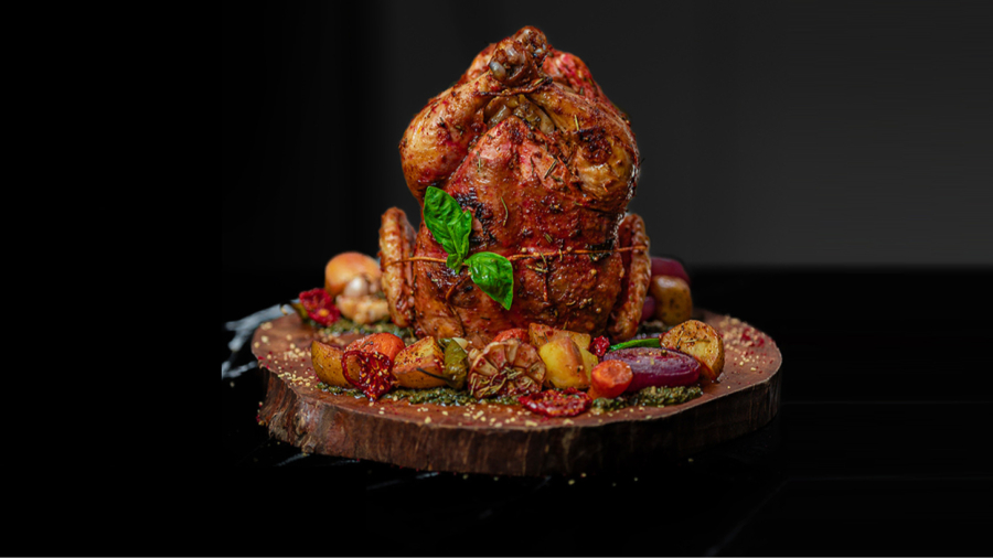 طرز تهیه مرغ شکم‌ پر مجلسی؛ راز خوشمزگی در هر لقمه!